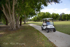 Mackay Golf Club Pic 4 - Electric buggy can be used around the course like here on the 13th fairway