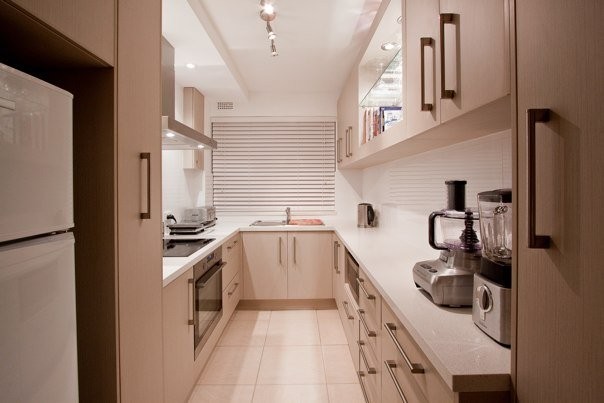 Emerald Building & Carpentry Services Pic 1 - A designer board was used to make the doors drawers for this kitchen finished off with a Caesar stone bench top