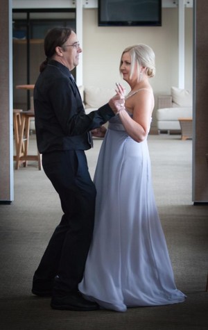 Your First Dance Co. Pic 4 - Chris Glenda dancing down the aisle for there ceremony at there 25th Wedding Anniversary Party