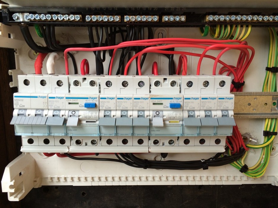 Top Tier Electrical & Data Pic 1 - Working on a switchboard upgrade from an old fuse board in Heidelberg Safety first