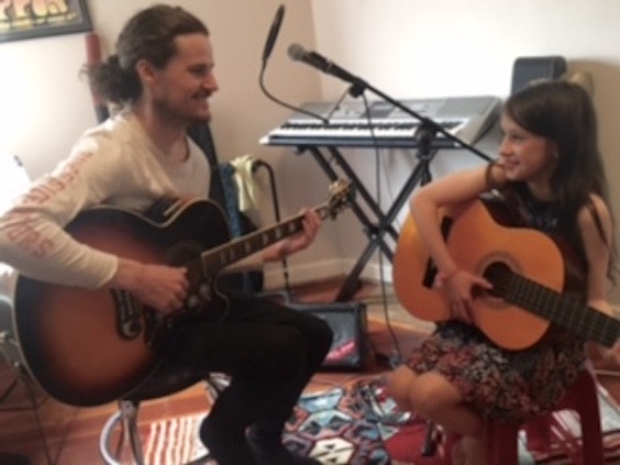 Bayside Guitar School Pic 1 - Matt Giving Kim a Lesson At The St Kilda Studio