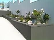 N & M Plastering Contractors Pty Ltd Pic 4 - Planters