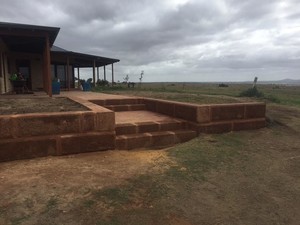 LP Earthworks & Contracting Pic 2 - Gravel Soapstone Retaining wall with stairs incorporated