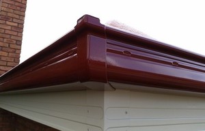 Raincatchers Guttering Pic 4 - Hunter Red Quad Gutter with Smooth Cream Fascia Cover