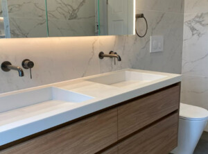 Decura Design Pic 3 - We designed seamless Corian integrated basins to suit a functional and timeliness vanity for our client