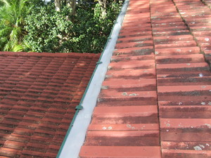 We Clean Gutters Pic 3 - Aluminum gutter guard on tiled roofs