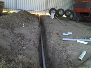 Scotts Excavations Pic 2 - Putting in storm water trenches and pipes in a shed floor