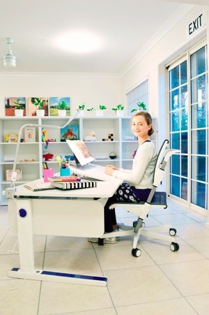 Acorn Ergonomics Pic 2 - Moll Champion Desk with right side table top adjusted up Folding Book Rest Flexlight and Scooter Chair in our showroom