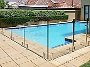 Dunn & Farrugia Fencing and Gates Pic 1 - Glass Pool Fencing with stainless steel spigots