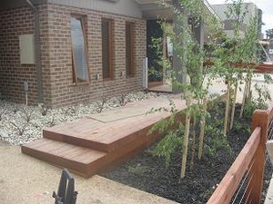 Mosaic Landscapes Pic 3 - Timber decking with advanced trees