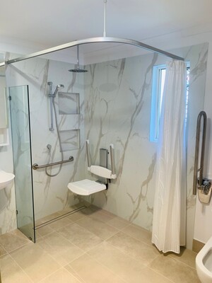 Ausnorth Building & Construction Pic 2 - Ausnorth Home Modification Bathroom with Curtain