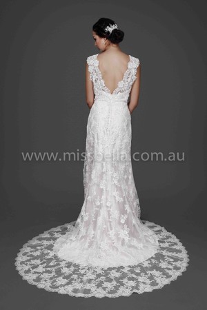 Miss Bella Pic 5 - This is the back view of our Chanel Wedding Dress A heavy lace dress sits over a silk under dress with a low cut back Stunning Wedding Dress