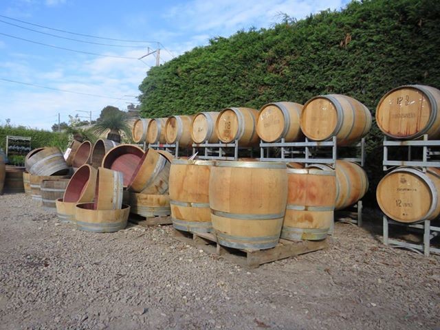 Simon The Plantman Pic 1 - Barrel Stack Full 34s 12s are readily available in the nursery Ask us for the multitude of uses these historic barrels can serve