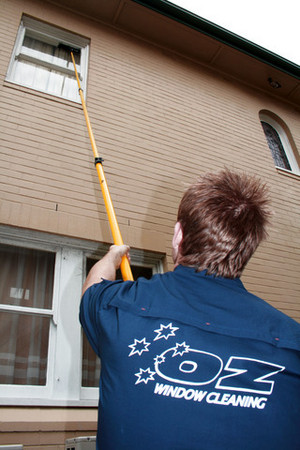 Oz Window Cleaning Pic 3 - house soft washing though waterfed poles