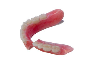 Denture Creations Pic 5 - Fractured lower dnture that is able to be repaired