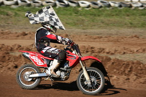 Norwest Motorcycle & Custom Repairs Pic 2 - Aaron Fulton aboard his CRF150R winning Central Coast Cup May 2013