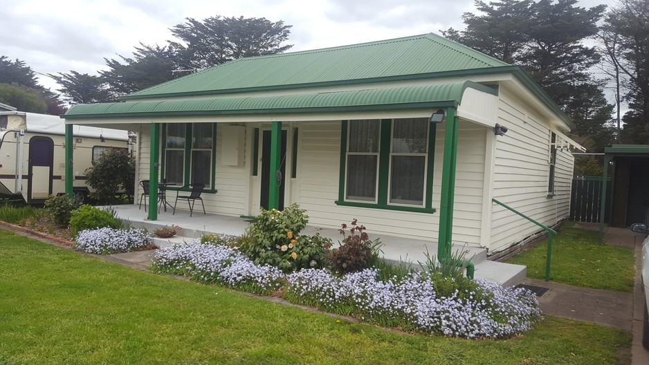 Fernie's Painting Pic 1 - Outside of a home I painted weather boards windows and the poles at the front