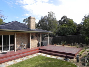 Decking Out Melbourne Pic 4 - Best of both worlds beautiful decking stepping onto lush grass and surrounded by gardens