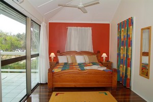 Arcadia Beach Guest House Pic 2 - Lovers Bay room with king bed corner bath separate shower kitchenette tv dvd and large balcony with views of Geoffrey Bay Price includes Tropical Island cont bfast