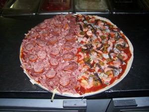 A1 PIZZA port pirie Pic 5 - Half meat lovers and half seafood before the cheese was added