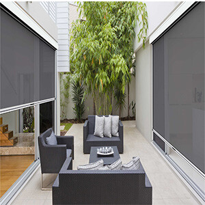 Ziptrak Blinds Adelaide Pic 1 - A modern outdoor patio with sleek semitransparent Ziptrak blinds Adelaide provides a stylish and functional space offering protection from the elements while maintaining a clear view