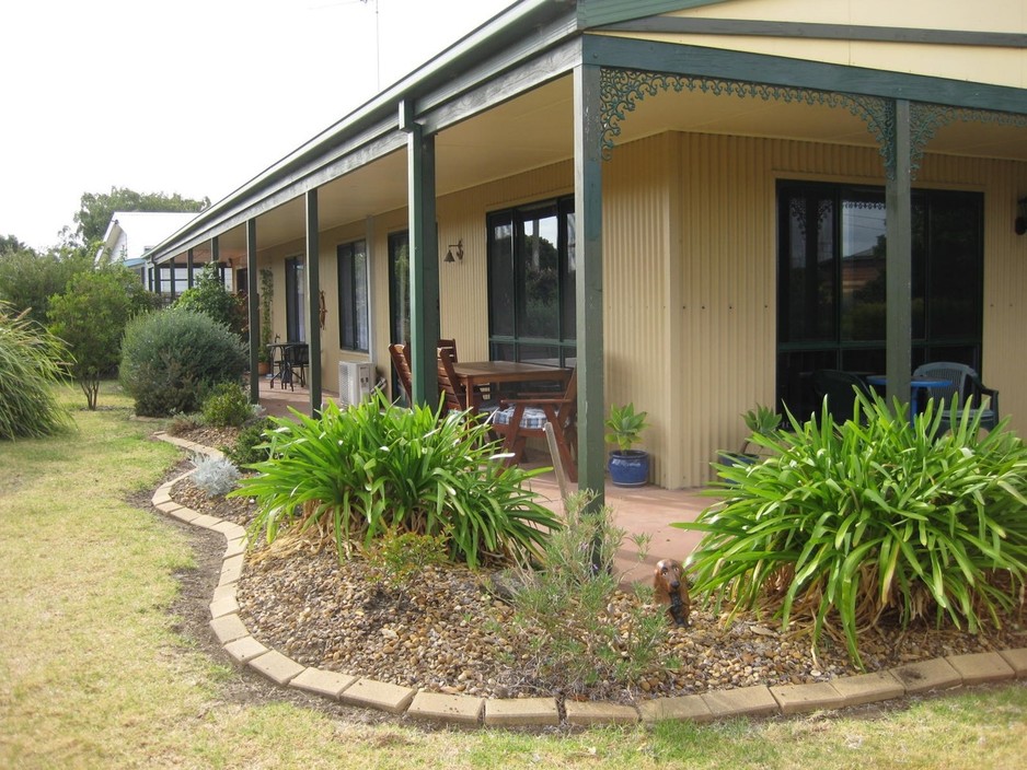 Bells By The Beach Holiday House Pic 1 - Dog friendly garden sunny location secure fences for kids and animals