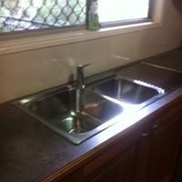 Taps N Toilets Plumbing Services Pic 3 - new sink and tap to freshen up kitchen without renovation