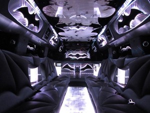 Hummer City Limousines Pic 5 - Black Batman hummer Limousine Perth hire Batman themed interior 16 seater