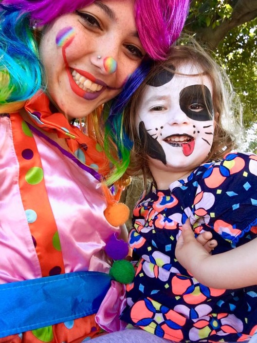 Sunflower Entertainment Pic 1 - Poppy the Clown with a happy little puppy