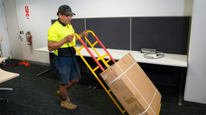 Egans Asset Management Pty Ltd Pic 5 - Pushing an office moving trolley