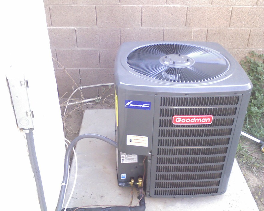 Crismic Services Pic 1 - an air conditioner condenser