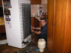 Crismic Services Pic 4 - chris repairing a domestic fridge