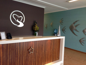 Northern Rivers Denture Clinic Pic 2 - Reception desk with the fish swimming up our northern river