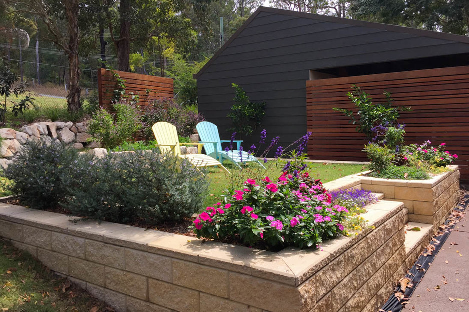 Grotec Landscape Solutions Pic 1 - Combinations of colourful perennials and ground covers were used around this property create a sense of space that blends effortlessly into its natural surroundings