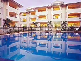 Cayman Villas Port Douglas Pic 1 - The pool at Cayman Villas Port Douglas at dusk