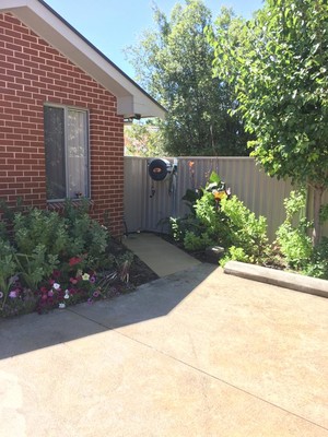 Piper Electrical & Communications Pic 3 - More than just electrical work Hose reel installation and garden path Another happy customer