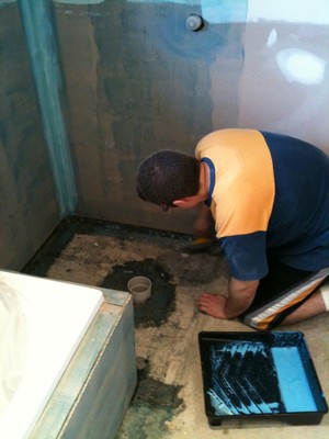 Wet Shield Water Proofing Pic 2 - Applying primer coat to shower