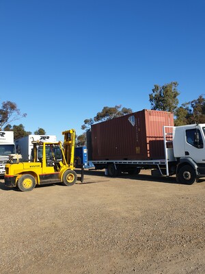 AR Removals & Storage Pic 2 - loading containers for interstate or storage