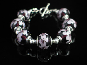 Mason Glassworks Pic 5 - handmade glass bead bracelet amethyst floral twist