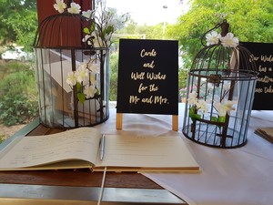 Hopscotch Weddings & Events Pic 3 - A cute guest book and wishing well set up We can help design and plan your event in Perth and surrounds