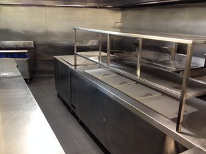 Restaurant Care Pic 5 - We dont just clean what you can see We work to achieve a sparkling result After service image walls floor ss benches sinks and shelving