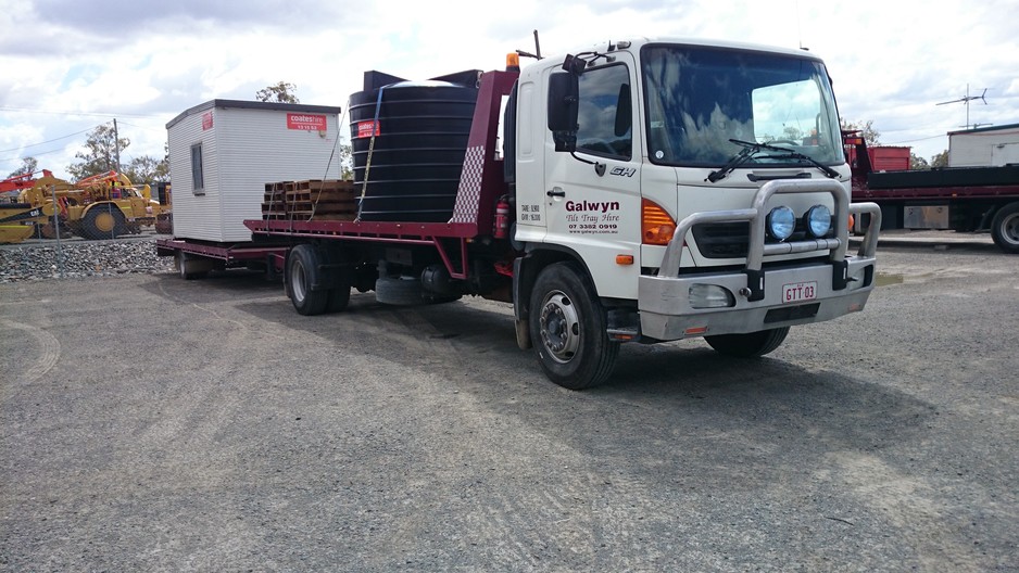 Galwyn Tilt Tray Hire Pic 1 - Rigid Tilt Tray Truck 72mtr tray length 6t carrying capacity towing tag trailer 72mtr tray length 4t carrying capacity both on air bag suspension with container pins