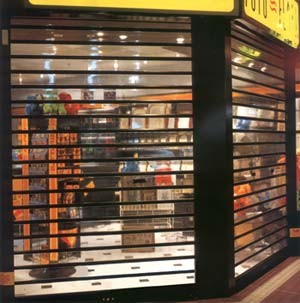 Advanced Shutter Industries Pic 2 - Clear polycarbonate roller shutters for shopfronts in shopping centres take up minimal space but offer full visibility security Knightguard Visionline are custom made in Sydney