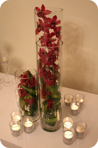 One Enchanted Day Pic 2 - Submerged flowers in glass vase centrepiece with candle votives