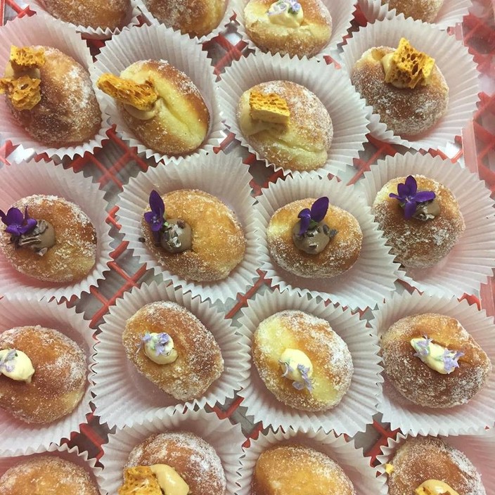 Tivoli Road Bakery Pic 1 - Doughnuts Salted caramel and honey comb chocolate and violet rosemary and custard