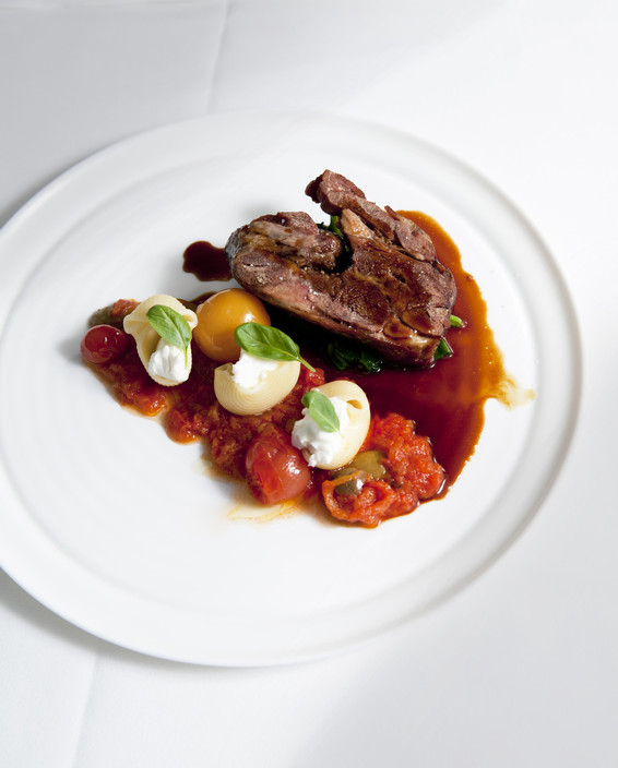 Chill On Tedder Pic 1 - slow cooked lamb shoulder rubbed with rosemary and anchovy confit tomato basil and olive fondue lumaconi pasta crumbled goats cheese pan juices