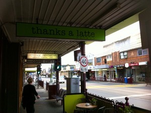 Thanks a Latte Pic 4 - Street side seating and signage