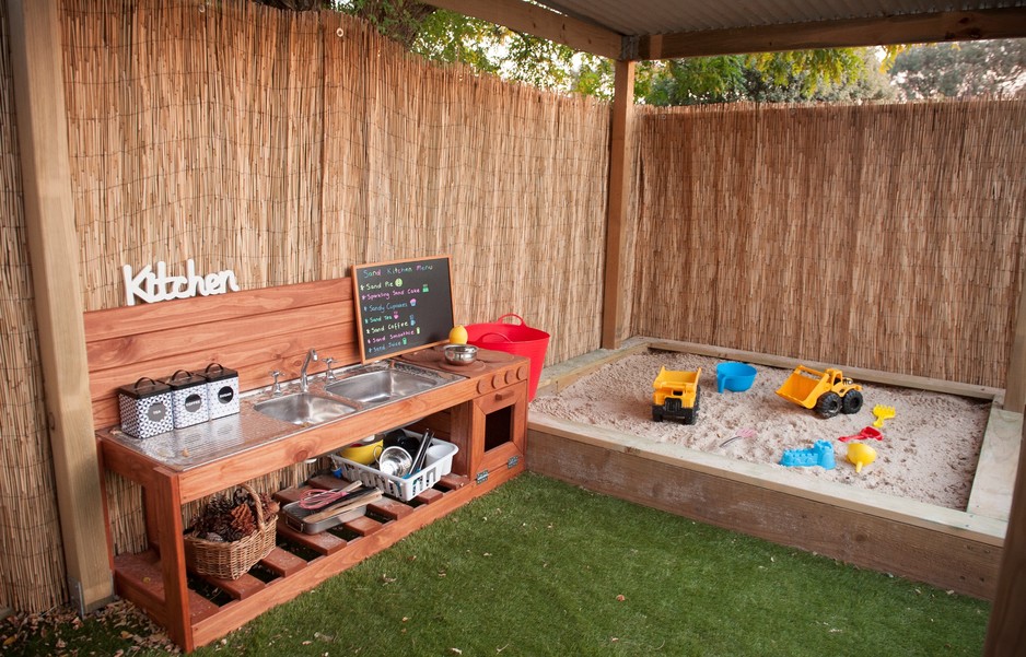 Garden Adventures Family Day Care Pic 1 - Our sandpit and sand kitchen