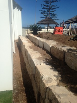 Harrington Bobcat Hire Pty Ltd Pic 4 - Rock Retaining Wall Landscaping