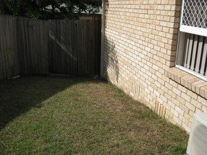 Pro-Check Building Services Pic 3 - The landscaping diverts water towards the house and this is not good for footings Building and Pest inspections for Pinjarra Hills Bellbowrie and Moggill areas